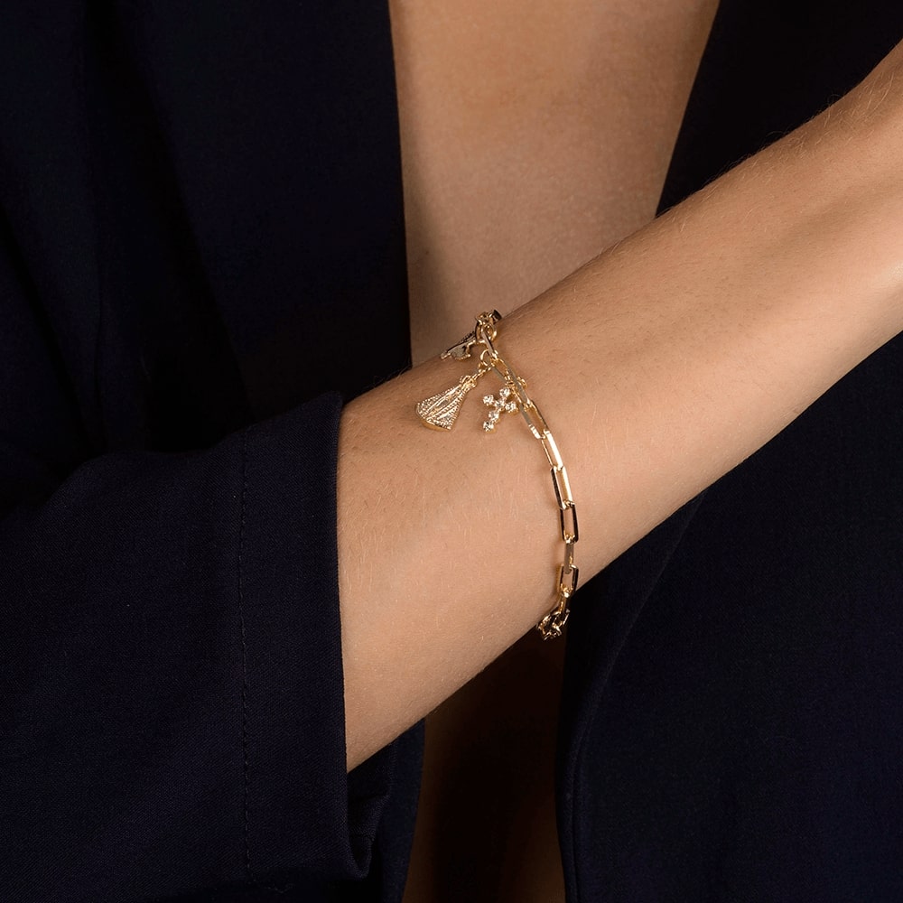 pulseira dourada religiosa nossa senhora, espírito santo e cruz cravejada de zircônia - galeria