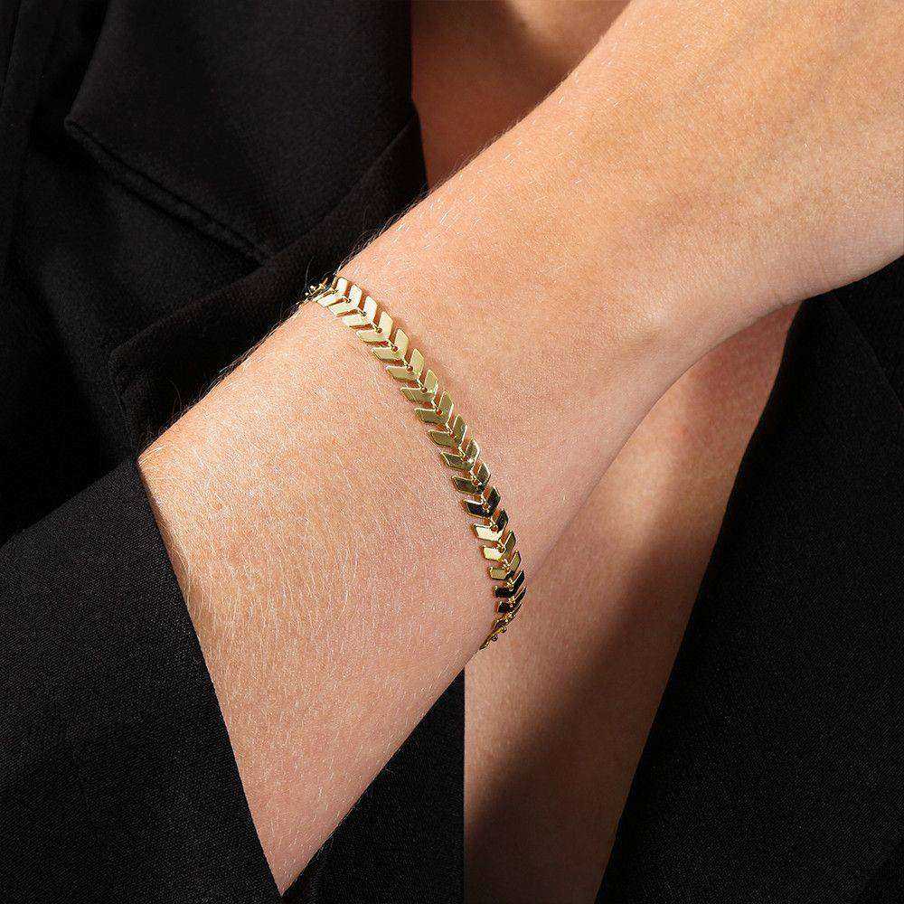 pulseira dourada de seta - galeria